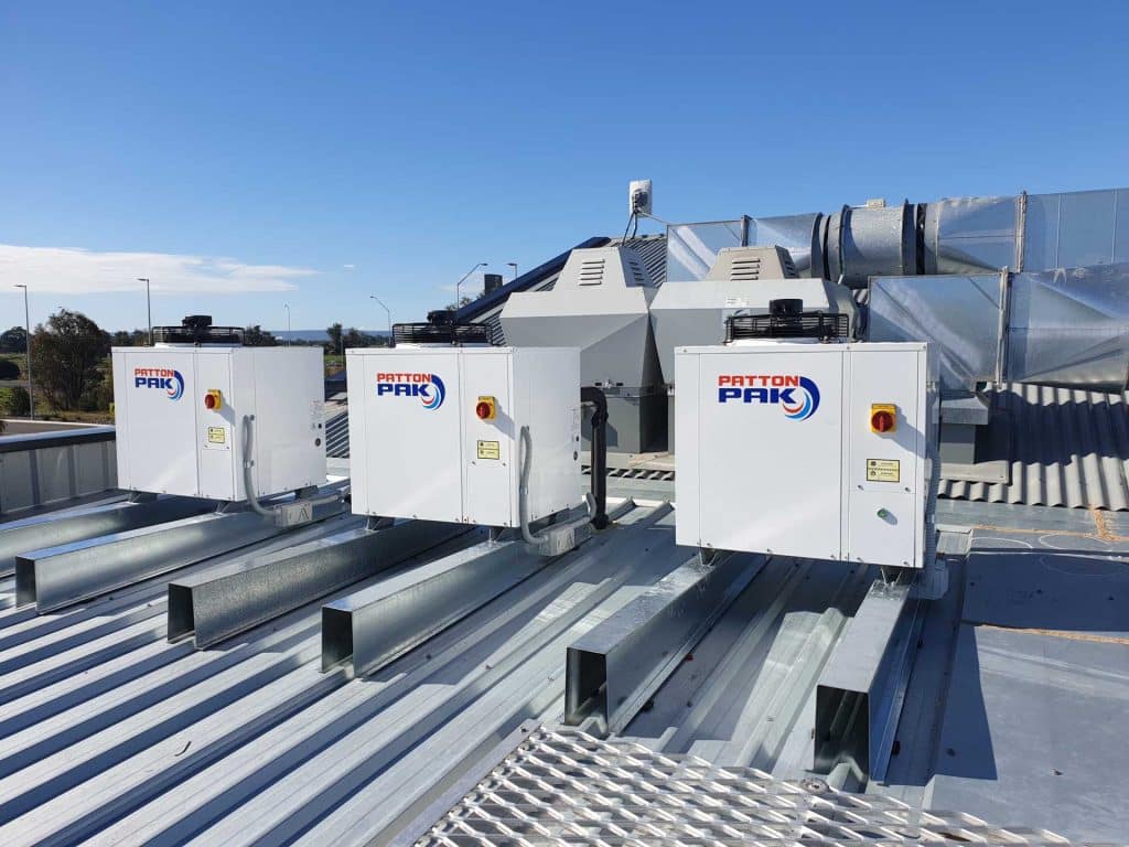 Aircon units in a line on a roof