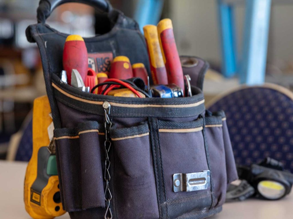 A toolbelt filled with tools
