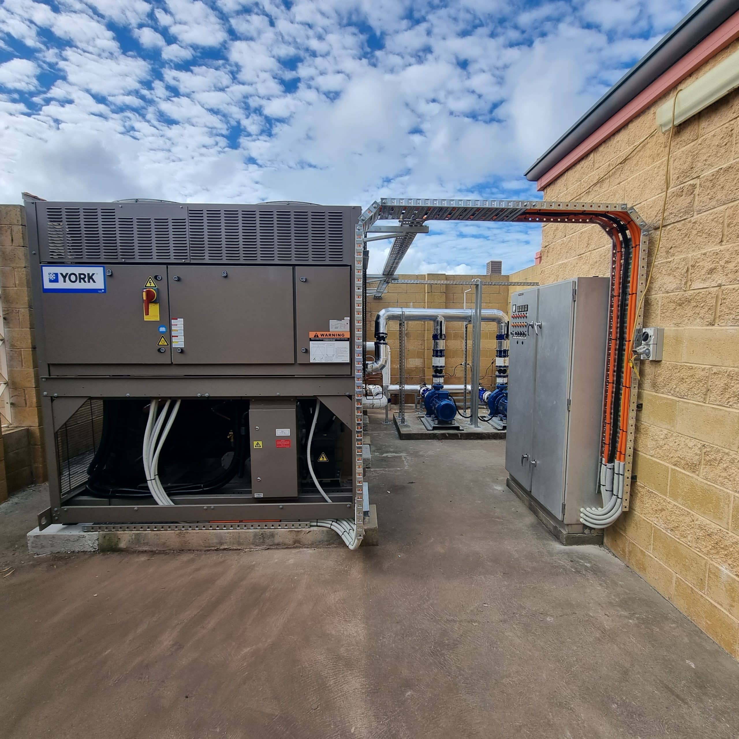 A large York branded power source for an air conditioning unit