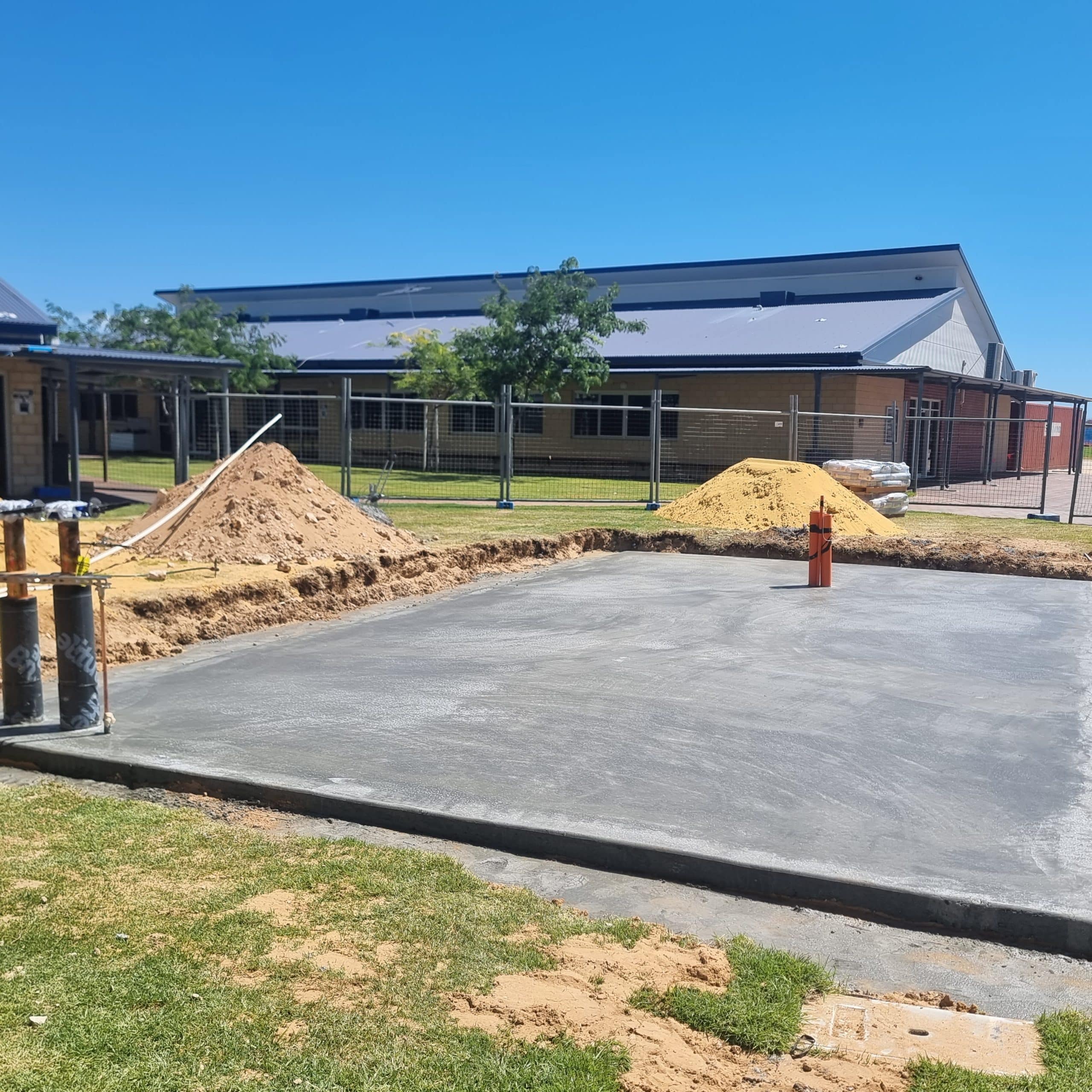 Freshly laid concrete ground outside Mandurah Baptist College