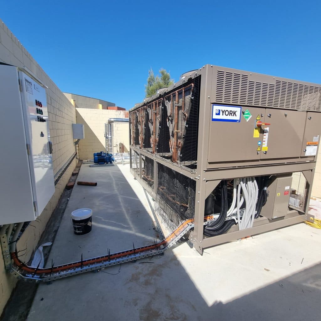 A large York branded power source for an air conditioning unit