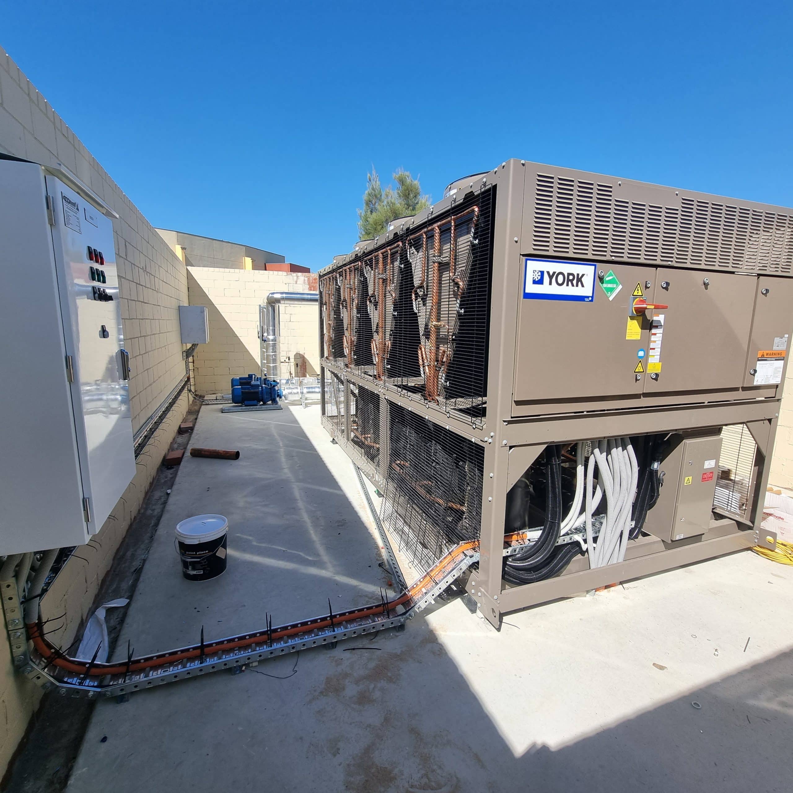 A large York branded power source for an air conditioning unit