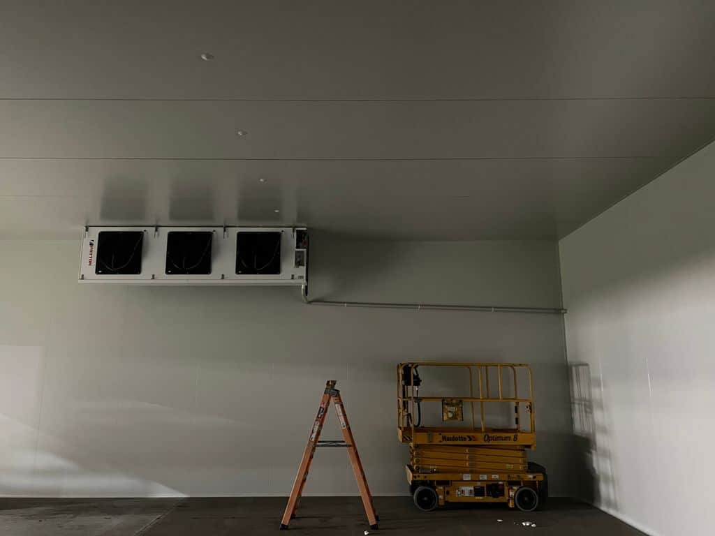 Empty cool room with air conditioning unit