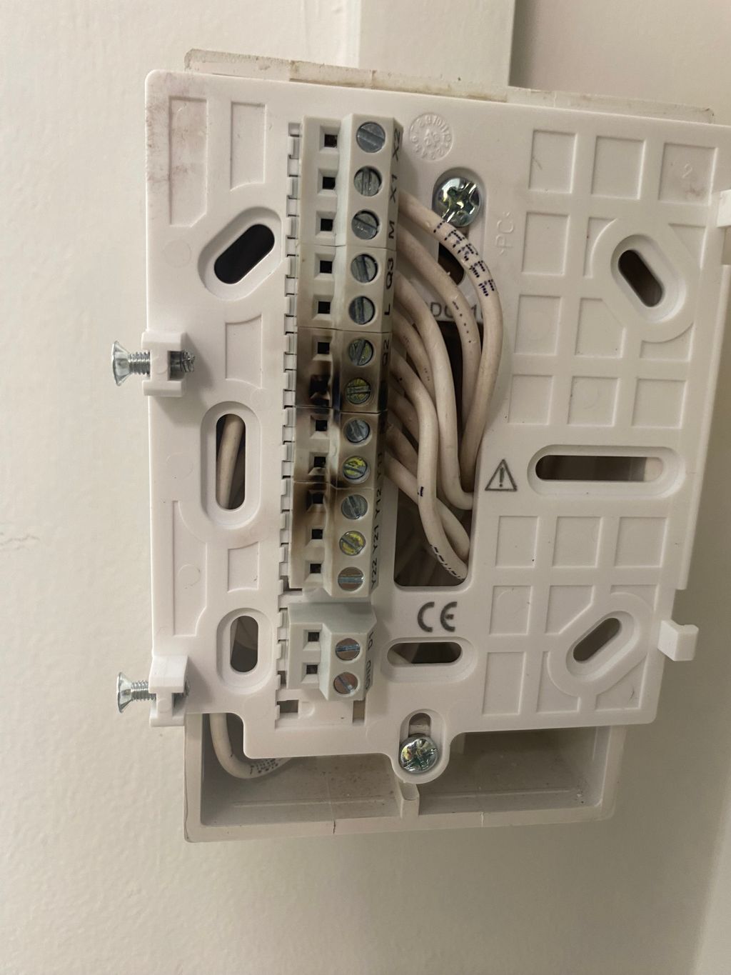 The power cables for an air conditioner unit