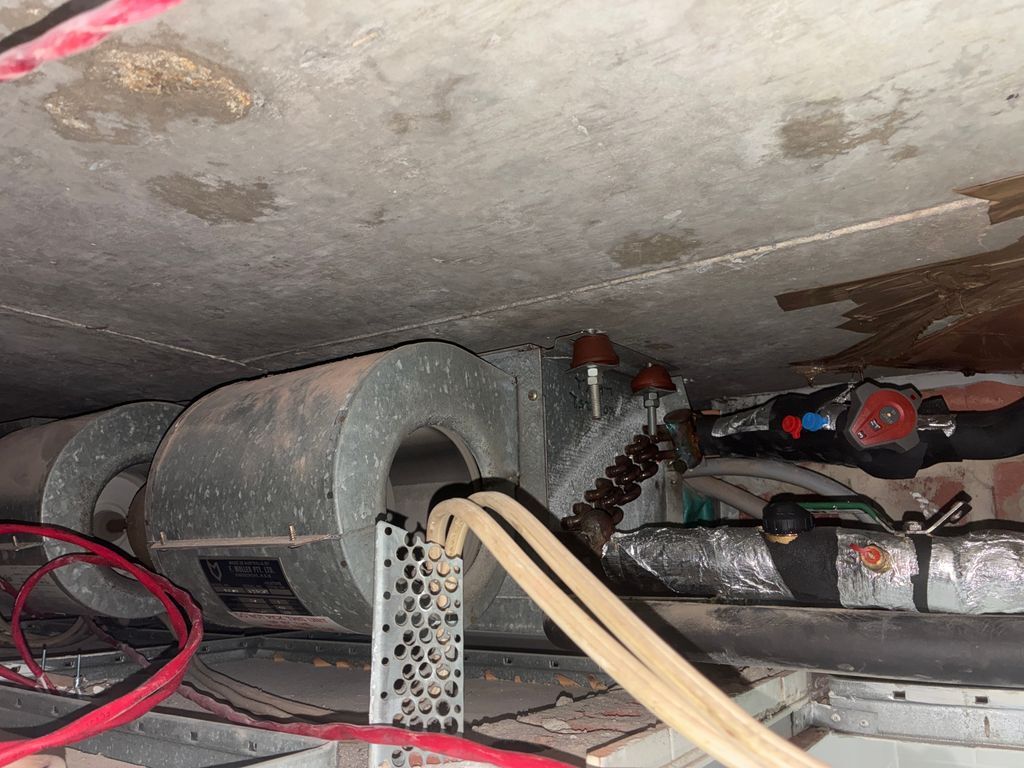 Dusty machinery stored in the ceiling