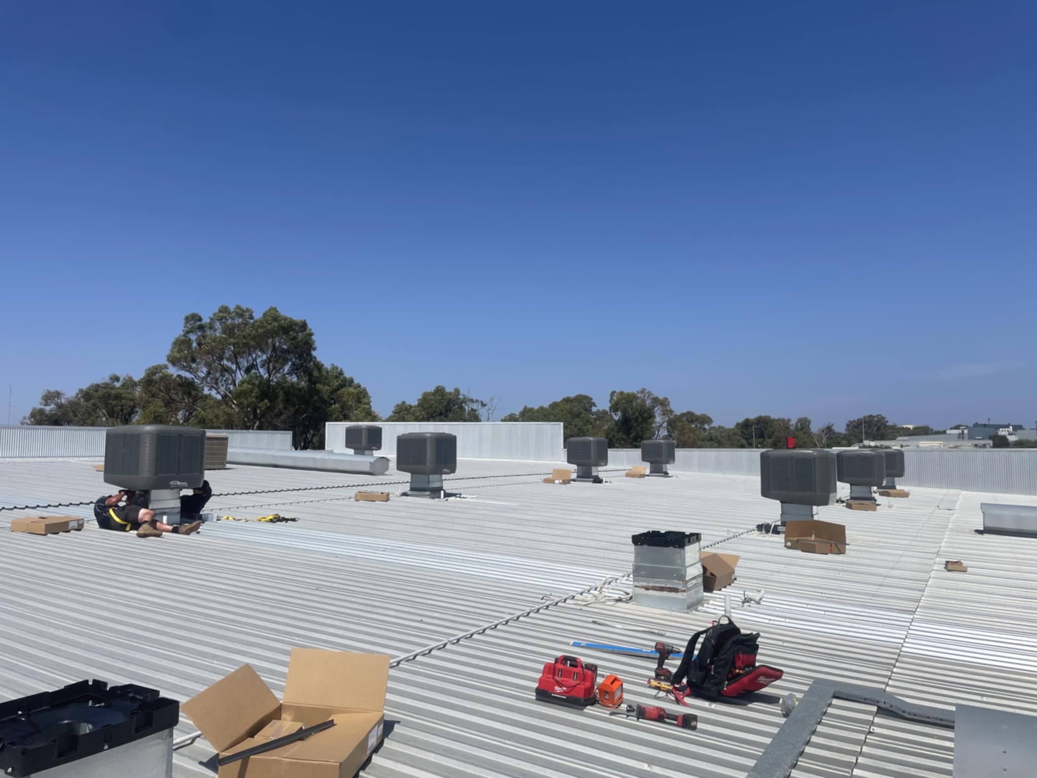 A Colorbond roof with built-in air conditioning equipment.